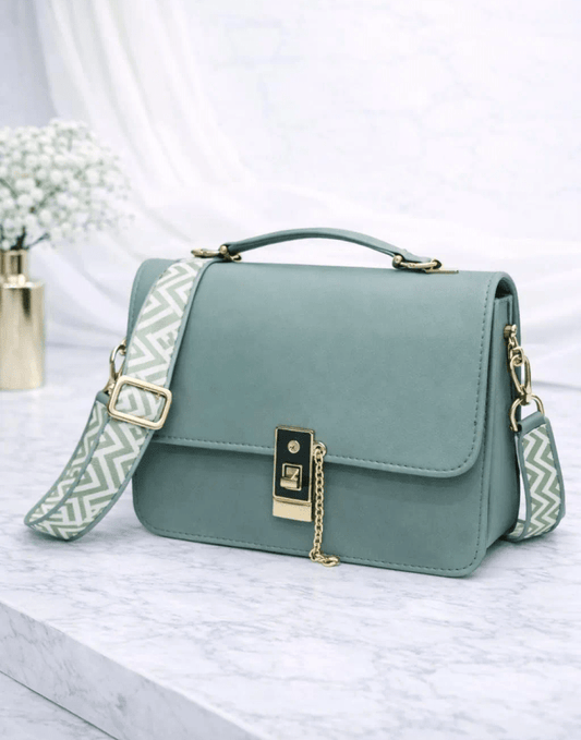 Chevron Strap Satchel Bag with Gold Chain Lock – Premium Vegan Leather - CASSxClassHandbagsChevron Strap Satchel Bag with Gold Chain Lock – Premium Vegan LeatherSilverChevron Strap Satchel Bag with Gold Chain Lock – Premium Vegan Leather