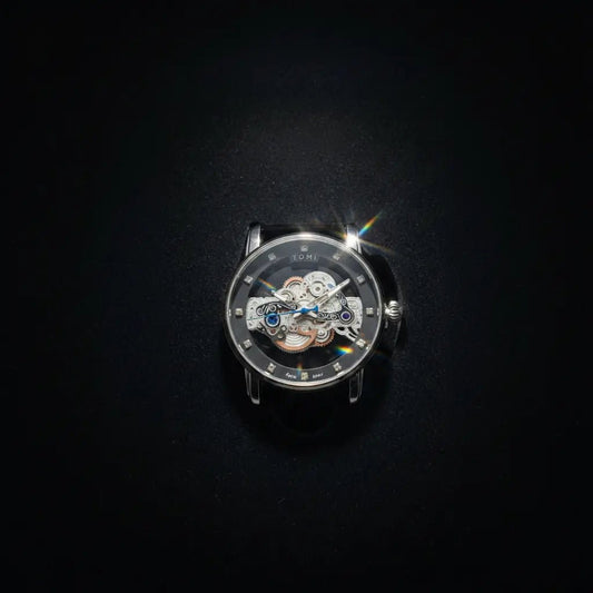 TOMI Skeleton Mechanical Watch – Luxury Transparent Dial with Interchangeable Leather Straps - CASSxClassWatchTOMI Skeleton Mechanical Watch – Luxury Transparent Dial with Interchangeable Leather StrapsMacro Velvet Hero Shot